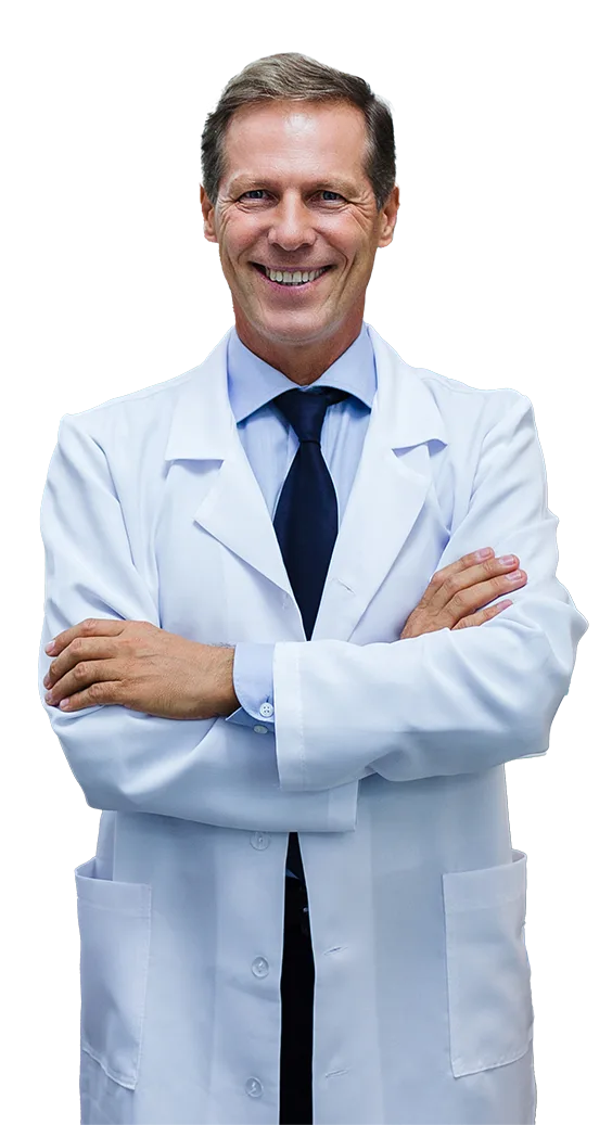 Smiling dentist in a white coat with arms crossed