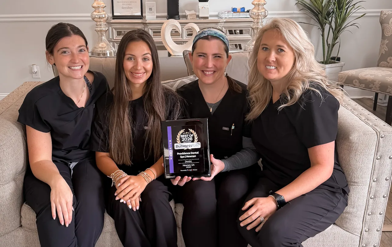 The Providence Dental Spa team holding their Best of 2026 award